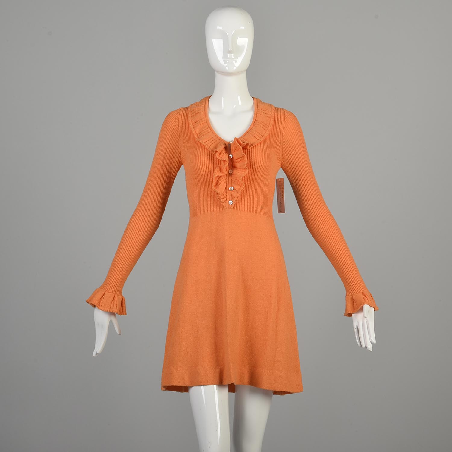 open lace back dress Estrella Long Sleeve Knit Mini Dress