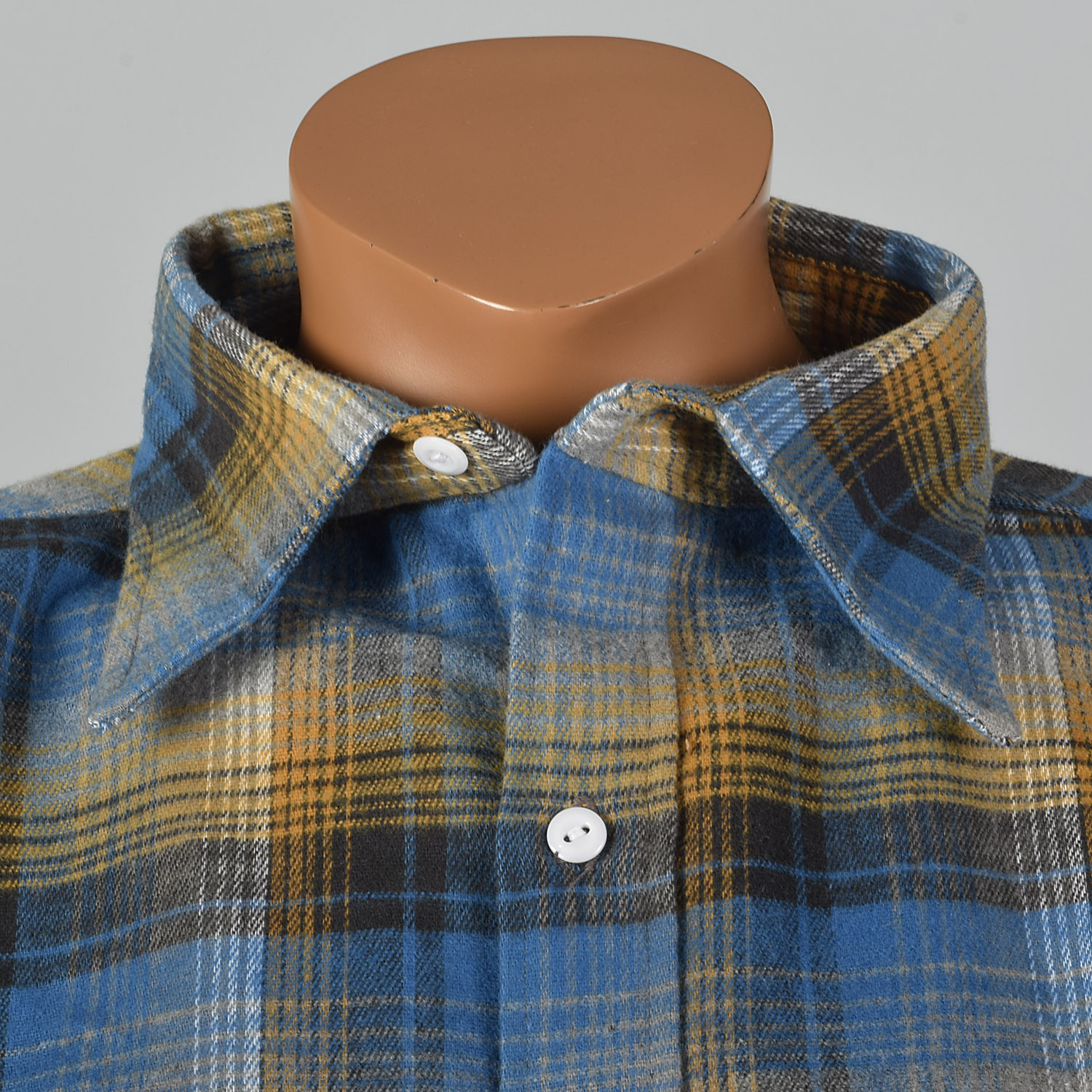 blue and yellow flannel shirt