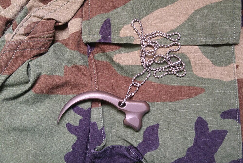 Raidops: Hawk Talon Titanium Pendant