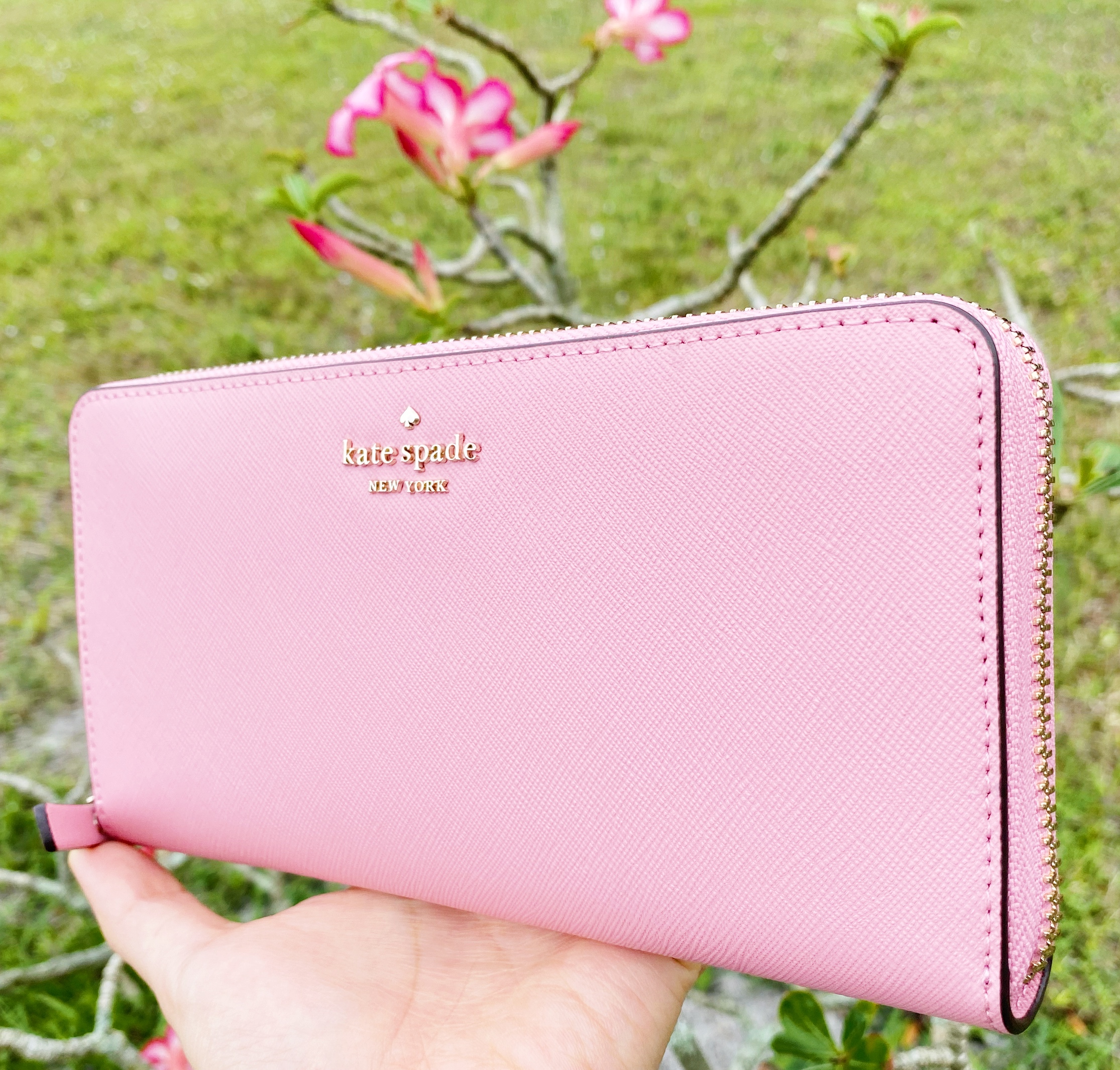 pink kate spade purse and wallet