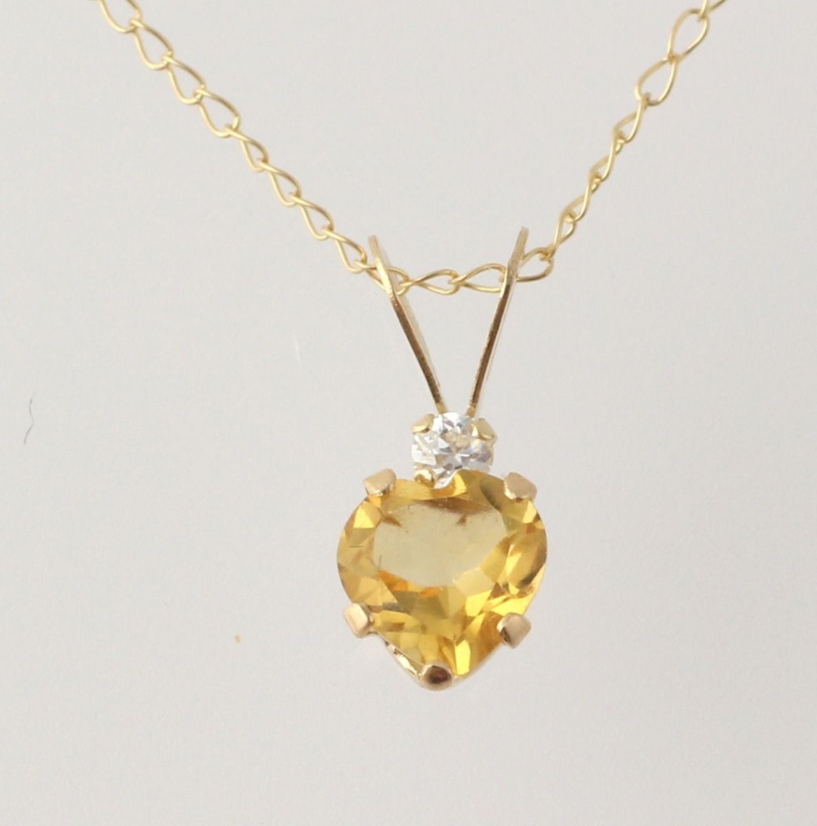 Aquamarine /& Cubic Zirconia Heart Pendant 10k Yellow Gold Womens .48ctw Fine